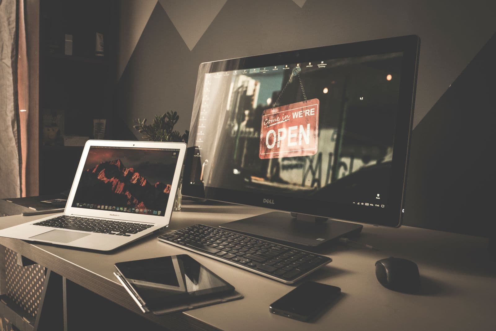 Organized desk and laptop representing a well-structured ChatGPT prompt library